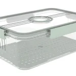 Clear plastic food storage container with lid and vent for freshness.