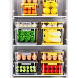Clear plastic pantry storage containers with colorful fruits and vegetables.