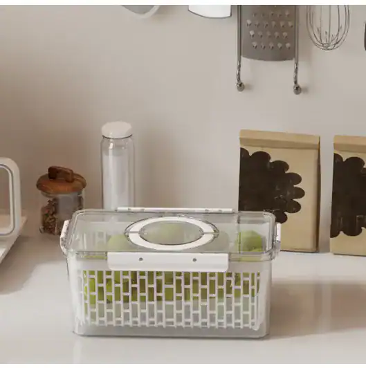 Clear pantry storage container with handle for kitchen organization.