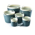 Set of blue and white pantry storage buckets with handles for organization.
