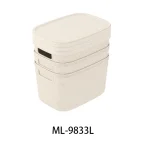Stacked beige storage baskets with lids for home organization.