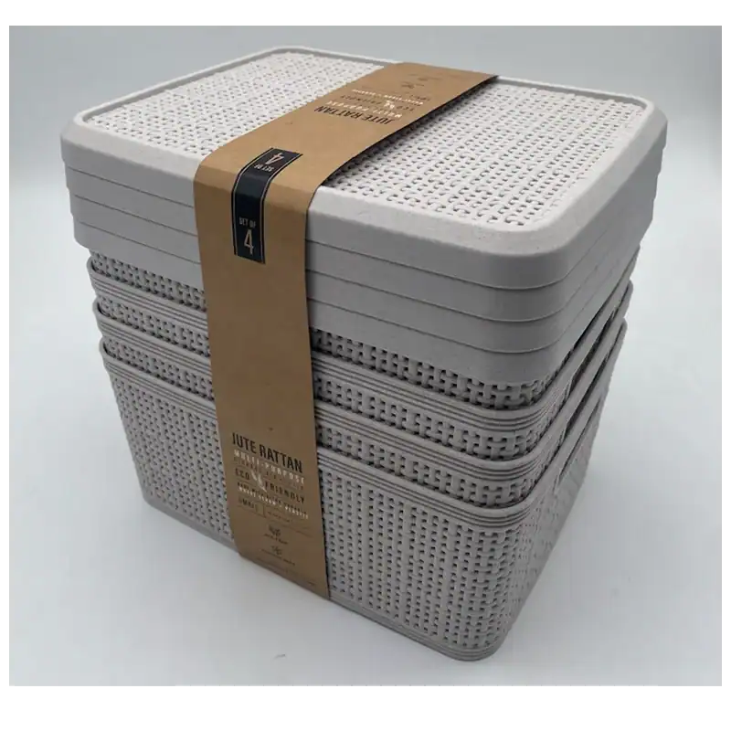 Stacked white plastic storage baskets with lids for home organization.