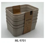 Set of beige plastic pantry storage baskets for home organization.