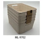 Stacked beige plastic storage baskets for pantry organization.